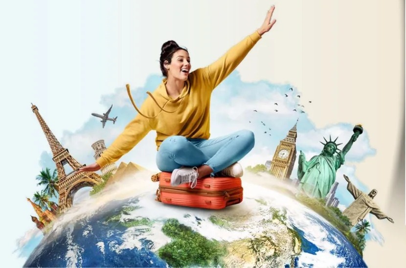 Viajante sentada sobre o globo com destinos do mundo inteiro